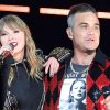 Robbie Williams cree que Taylor Swift no sabía nada de él cuando lo invitó a su show